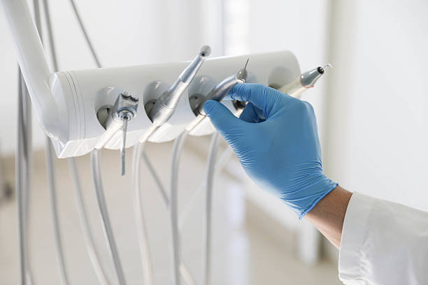 Professional Tooth Extraction technician working in Breckinridge Center, KY